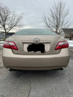 2007 Toyota Camry XLE rear view, showing no rust, clean condition, and garage-kept quality.