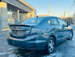 2013 Honda Civic Hybrid FWD with alloy wheels and rear camera in very good condition, 135k miles.
