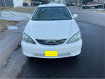 Front view of a 2006 Toyota Camry LE in white color, showing its condition and design.