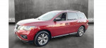 2017 Nissan Pathfinder S FWD in red, showcasing its sleek design and alloy rims, perfect for families.