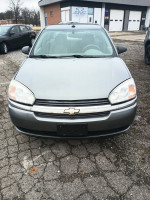 Front view of a 2005 Chevrolet Malibu LS, showcasing its clean exterior and detailed headlights.
