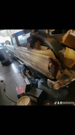 1958 Ford Edsel Ranchero in a garage with vintage items and modified features like police interceptor engine.