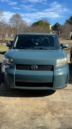 2010 Scion xB with 112,000 miles, showing front view and blue exterior in good condition