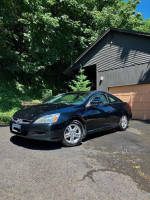 2007 Honda Accord EX-L Coupe parked outside with a clean title and low mileage