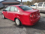2007 Volkswagen Jetta in fire engine red for sale, located in Montgomery, NY, with 110,000 miles and new tires.