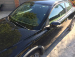 Black 2010 Volvo C30 in good condition, showing details of the exterior and Sparco wheels.