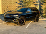 2015 Jeep Cherokee Limited FWD in great condition, equipped with leather seats and advanced features.