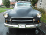 Front view of a classic 1950 Chevrolet hardtop with a matte finish and vintage design features.