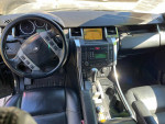 Interior view of 2009 Land Rover Range Rover Supercharged with black leather seats and navigation system