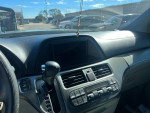 Interior view of a 2006 Honda Odyssey with a damaged transmission for sale at Auto Express of Ocala.