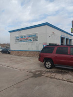 2003 Chevrolet TrailBlazer parked outside Car Time Automotive, showcasing its excellent condition and features.