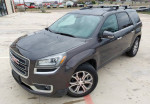 2013 GMC Acadia SLT SUV with leather interior and back-up camera, parked outdoors