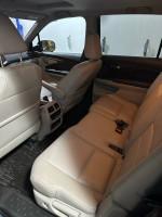 Interior view of a 2017 Honda Pilot EX-L showcasing spacious leather seats and modern features.