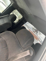 Interior view of a 2000 Chevrolet Silverado 1500 showing the seating and headliner.