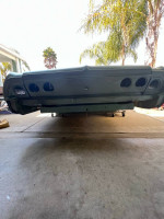 Underside view of a 1964 Chevrolet Impala project car with clean California title, ready for finishing.