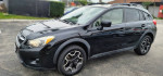 2014 Subaru Crosstrek 2.0i Premium AWD in black, featuring a clean interior and exterior, perfect condition with new tires.
