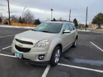 2013 Chevrolet Equinox LT AWD in champagne color parked in a lot, featuring leather interior and power sunroof.