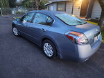 2012 Nissan Altima S Model parked in driveway, clean body, ice cold AC, original owner, 97,000 miles
