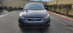 Front view of a 2013 Subaru Crosstrek, grey color, clean title, 171k miles, prepared for sale.