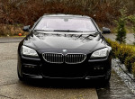 Front view of 2012 BMW 650i gran coupe in black with luxury features and low mileage.