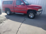 1995 Dodge Ram 1500 SLT in red, V8, 4x4, with new tires and clean title for sale in Albuquerque, NM.