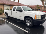 2008 Chevrolet Silverado 1500 Work Truck 4WD parked with minor damage; well-maintained with low mileage.