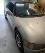 1991 Honda Beat Convertible with damaged engine, included new parts for repair, parked indoors