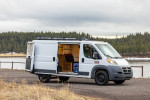 2017 Ram 1500 Promaster van with adventure build, located in Flagstaff, AZ, featuring solar panels, seating area, and sleeper.