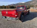 2012 Ram 2500 Power Wagon 4WD truck with 146,000 miles, showing body dings and dents in outdoor setting.