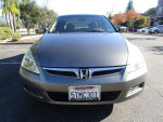 Front view of a well-kept 2006 Honda Accord EX Sedan with navigation.
