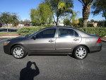 2006 Honda Accord EX sedan in excellent condition with 54k miles, clean exterior and interior, parked outdoors.