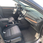 Interior view of a 2021 Honda CR-V EX with comfortable seating and modern technology features.
