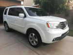 2013 Honda Pilot EX-L SUV in excellent condition, taffeta white exterior, parked on driveway.