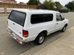 1995 Ford Ranger regular cab in good condition parked on the street with clean title and low mileage.