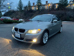 2011 BMW 328xi with 116,000 miles, clean exterior, and new tires parked outdoors.