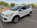 White 2013 Ford Escape SE FWD parked in a lot, featuring new tires and a clean exterior.