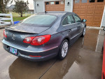 2009 Volkswagen CC parked with new parts and features like backup camera and rain-sensing wipers.