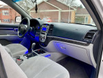 Interior view of a 2009 Hyundai Santa Fe with comfortable seating and modern dashboard controls