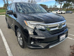Black 2019 Honda Pilot EX-L AWD SUV parked with low mileage, excellent condition, and premium features.