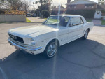 1966 Ford Mustang in Wimbledon white with red interior, 289 V8 engine, great condition, one owner car.