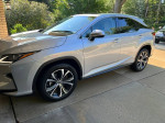 Clean 2019 Lexus RX 350 parked displaying its sleek design and alloy wheels