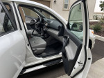 Interior of a 2012 Toyota RAV4, showcasing leather seats and dashboard in immaculate condition.