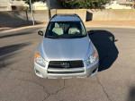 Front view of a 2010 Toyota RAV4 with clean exterior, perfect for city and highway driving.
