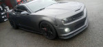2010 Chevrolet Camaro LS with custom racing suspension and Brembo brakes, displaying sleek design and HID headlights.