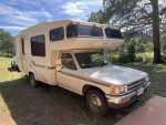 1990 Toyota Sunrader Motorhome with V6 engine, LED lights, and custom features for camping and travel.