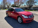 2009 Infiniti G37 RWD sedan in red color parked on street, showcasing its sleek design and premium features.