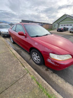 2000 Honda Accord LX in red parked on the street, showing good condition and low mileage of 96,000 mi.