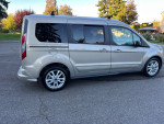 2014 Ford Transit Connect XLT LWB in excellent condition with 90,000 miles, parked on a driveway