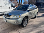 2008 Lexus RX 350 in excellent condition, light tan leather interior, features sunroof, navigation, and backup camera.