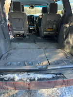 Interior view of 2009 Toyota Sienna LE showing spacious rear seating and cargo area